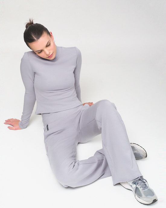 Grey wide leg yoga pants with a long sleeve turtle neck 