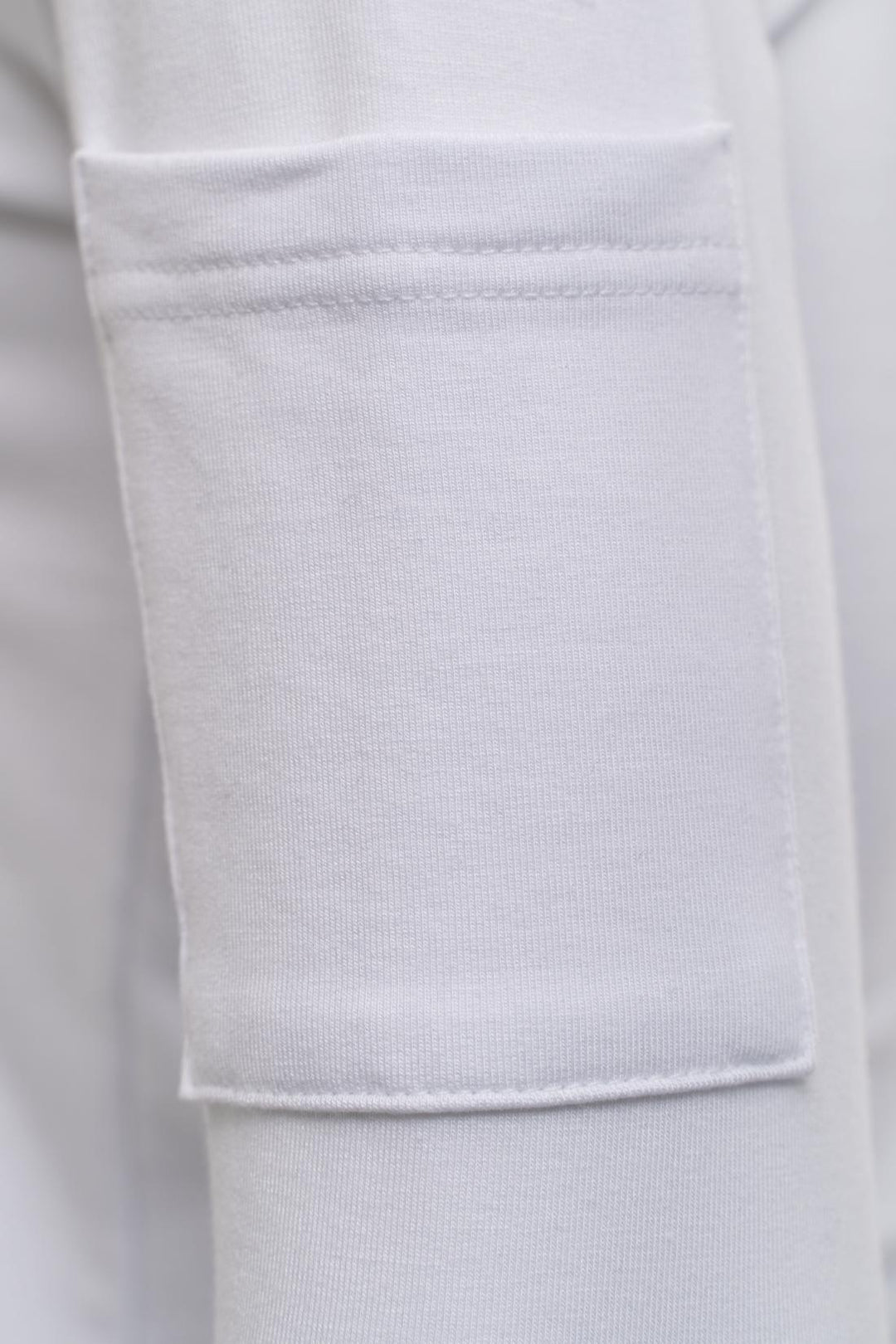White hoodie sleeve pocket